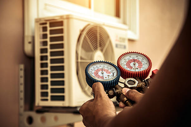 Professional Hvac technician working in Ore City, TX